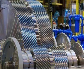 Heavy-duty helical gears reverse engineered and cut in-house.