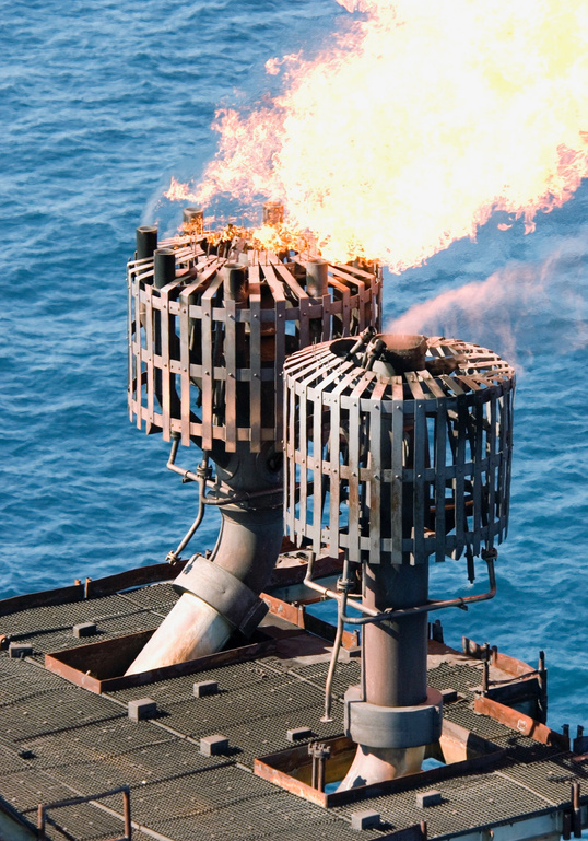 Flare tip assemblies in operation, delivering clean, smokeless combustion at sea.